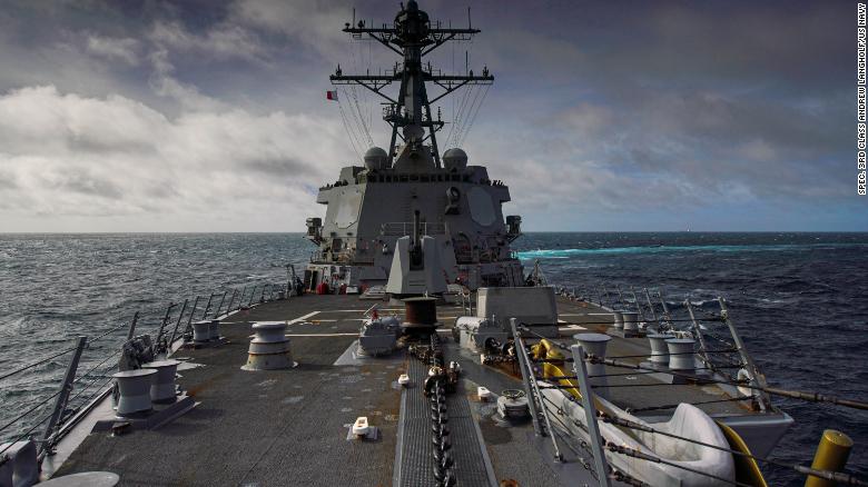 The guided missile destroyer USS Halsey conducts a routine transit through the Taiwan Strait on August 30.