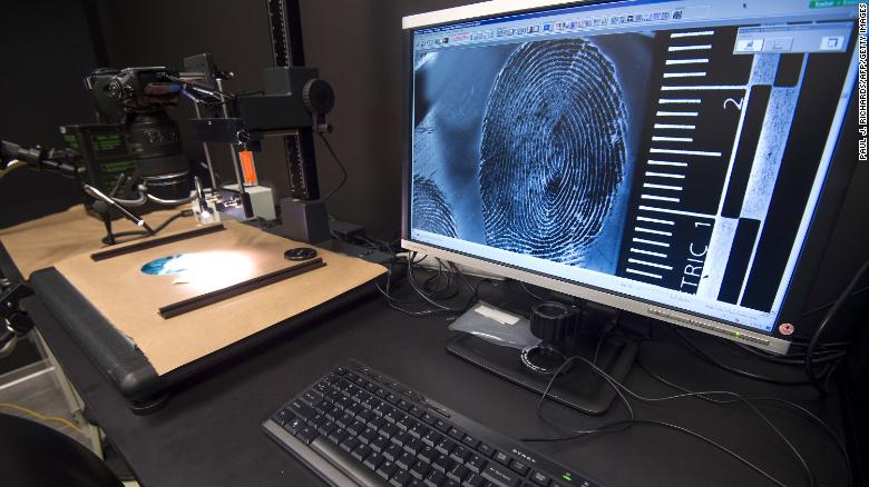 In this July 20, 2016, file photo, a fingerprint is enlarged for examination in the Latent Print Lab at the US Homeland Security Investigation Forensic Laboratory in Tysons Corner, Virginia.