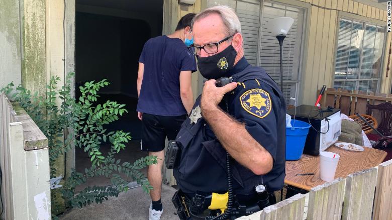 Deputy Bennie Gant with the Harris County Constable's Office executes a warrant.