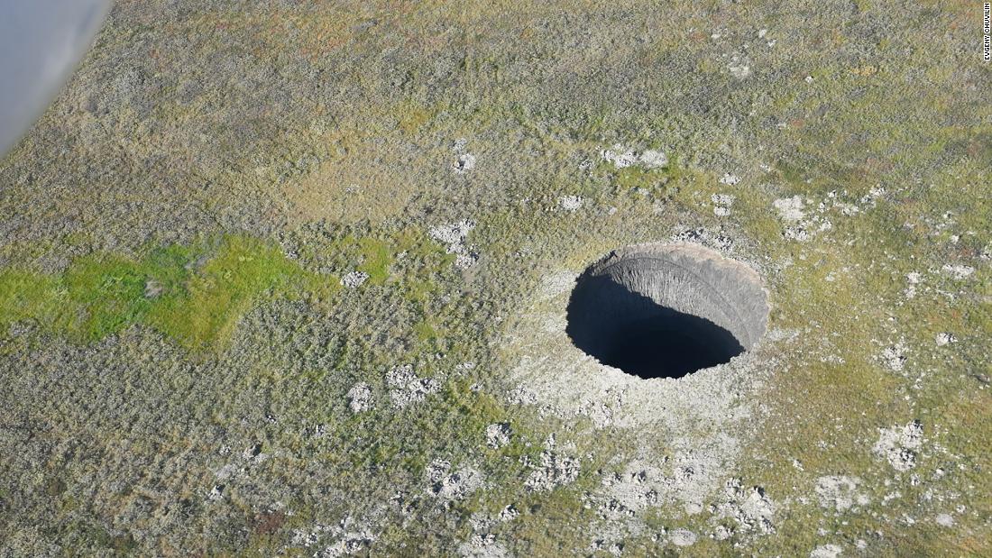 Massive mystery holes appear in Siberian tundra — and could be linked to climate change - CNN