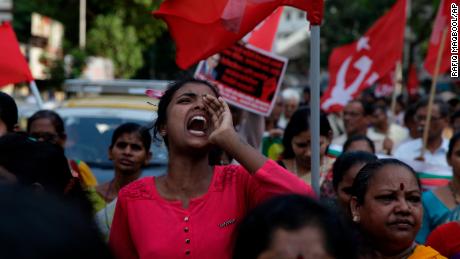 Members of Dalit groups shout slogans during a protest in Mumbai, India, Monday, April 2, 2018. Violence erupted in parts of north and central India as thousands of Dalits, members of Hinduism&#39;s lowest caste, protested an order from the country&#39;s top court that they said diluted legal safeguards put in place for their marginalized community. 