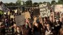 Activists march in Louisville on day of Kentucky Derby