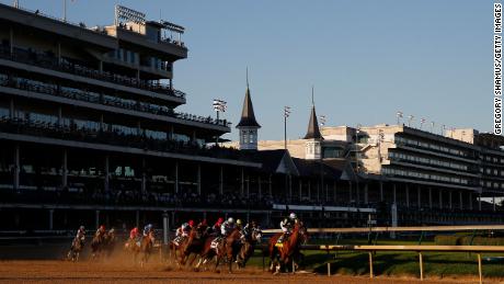 The Kentucky Derby returns to its regular race day, but fewer fans will attend because of Covid-19