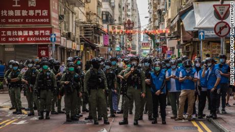 Police patrol an area in Hong Kong after protesters assembled on September 6.