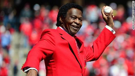 Hall of Famer Lou Brock throws out a first pitch before the St. Louis Cardinals home opener against the Milwaukee Brewers at Busch Stadium on April 11, 2016, in St. Louis, Missouri.  