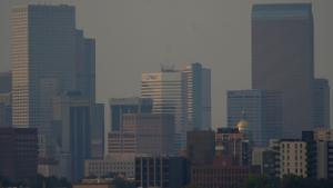 Smoke from the Cameron Peak wildfire occludes the skyline of downtown Denver, Sunday, Sept. 6, 2020, in Denver. The fire, which is growing in the hot, dry and windy weather, has forced evacuations, as well as the closure of the main road through Rocky Mountain National Park. (AP Photo/David Zalubowski)