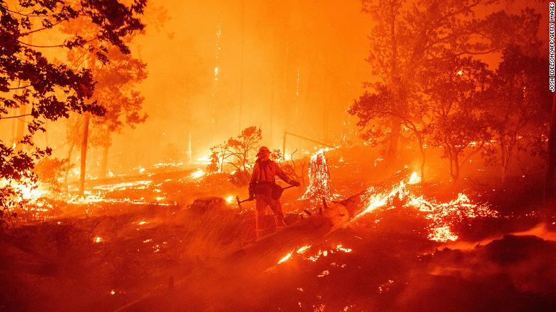 California wildfires rage as rescues and evacuations continue