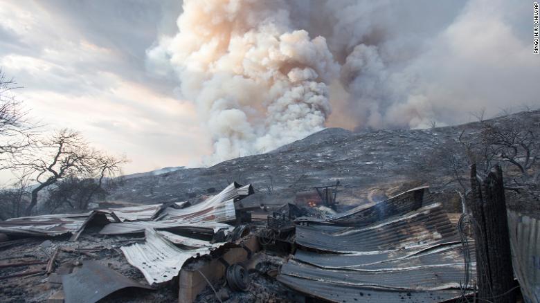 A burned structure is seen in the charred are hit by the El Dorado Fire.