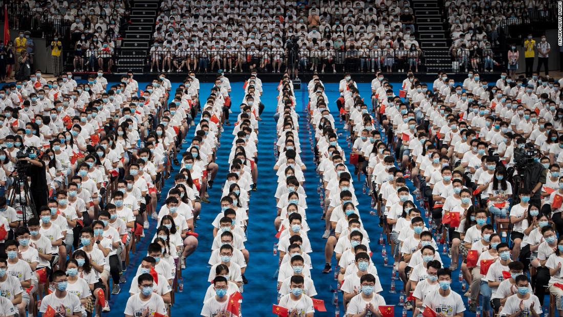 Students at the Huazhong University of Science and Technology attend a commencement ceremony in Wuhan, China, on September 4. Wuhan is where the coronavirus outbreak was first reported.