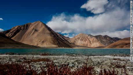 Mountains rise over the Pangong Tso Lake on October 5, 2012 near Leh in Ladakh, India. 