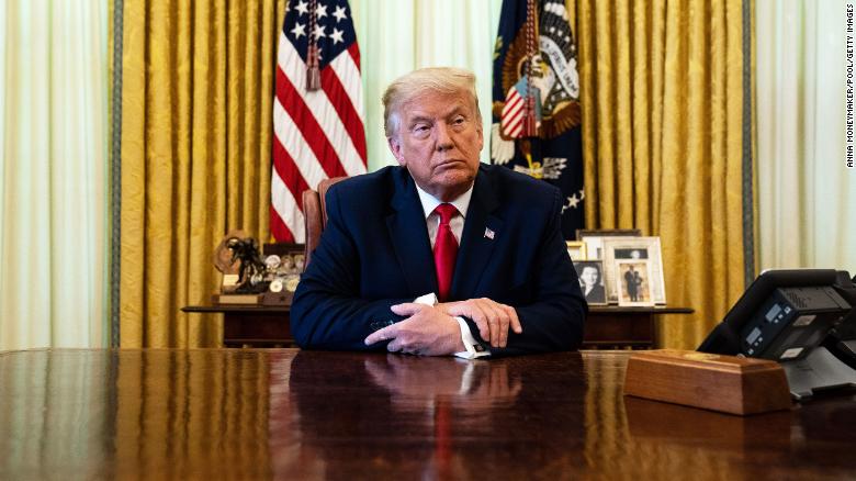  Donald Trump listens during an event in the Oval Office on August 28.