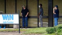 Clients line up outside the Mississippi Department of Employment Security WIN Job Center in Pearl, Miss., Monday, Aug. 31, 2020.  The U.S. economy&#39;s economic engine may be running out of fuel. Consumer spending accounts for about 70% of the U.S. gross domestic product, making it the single most important factor in recovering from one of the worst recessions on record. (AP Photo/Rogelio V. Solis)