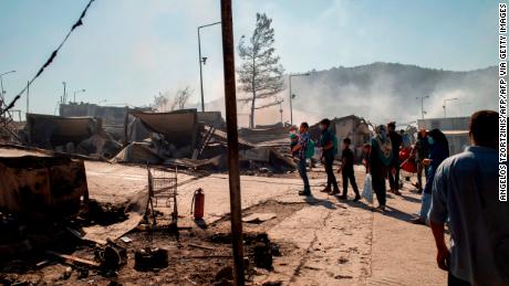 Smoke rises at the burnt camp of Moria on the island of Lesbos on Wednesday the morning after a major fire broke out.