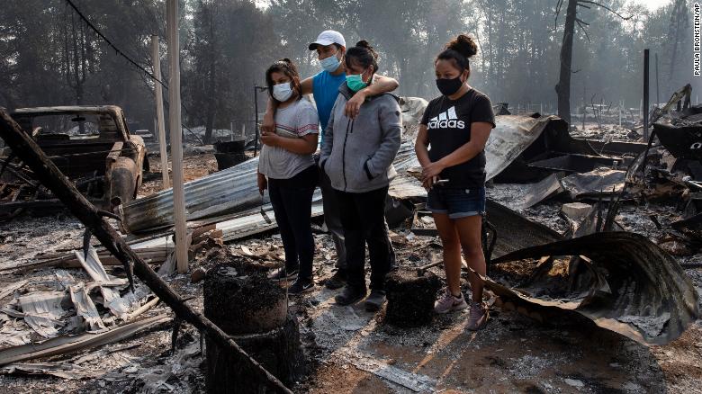 Many families in Phoenix, Oregon returned to asses the wildfire damage to find their homes completely destroyed.