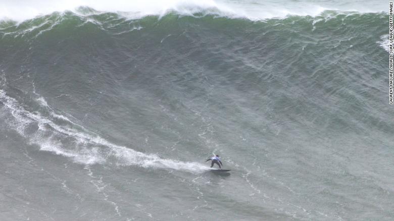 A Brazilian surfer broke her own Guinness World Records title by riding an epic wave