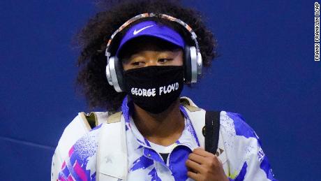 Osaka wears a face mask bearing Floyd&#39;s name before her match against Shelby Rogers.