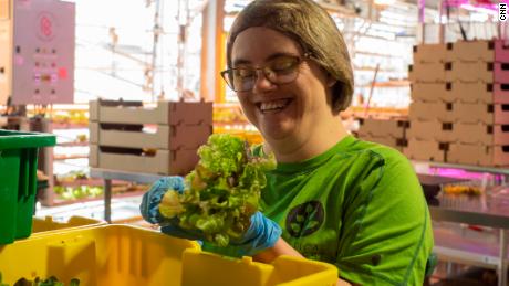 Mycah Miller, a Vertical Harvest employee, packages lettuce greens to be delivered to one of four grocery stores the vertical farm services in Jackson, Wyoming.