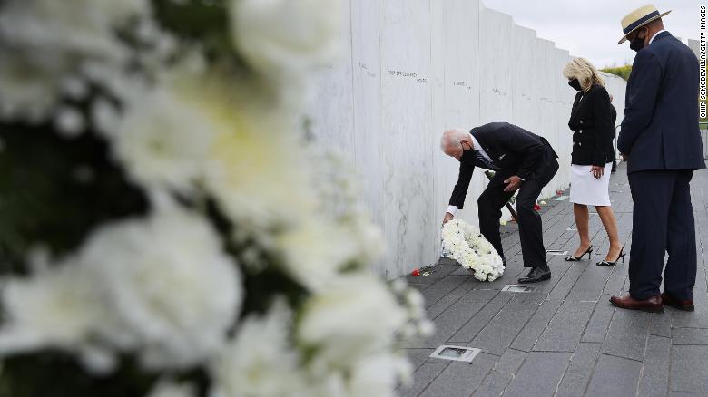 Former Vice President Joe Biden and Dr. Jill Biden are accompanied by Calvin Wilson as they lay a wreath at the Flight 93 National Memorial on the 19th anniversary of the 9/11 terror attacks September 11, 2020 in Shanksville, Pennsylvania. Wilson&#39;s brother-in-law was Flight 93&#39;s First Officer Leroy Holmes. Earlier in the day the Bidens attended a remembrance ceremony at the September 11 National Memorial in New York City. 
