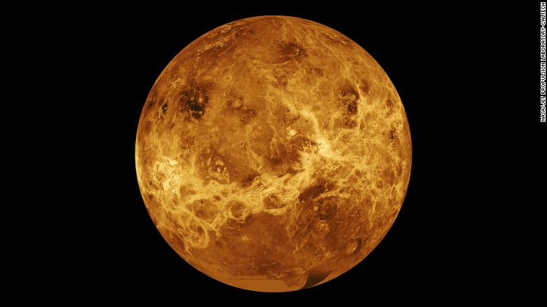 A global view of the surface of Venus centered at 180 degrees east longitude. The simulated hues are based on color images recorded by the Soviet Venera 13 and 14 spacecraft.