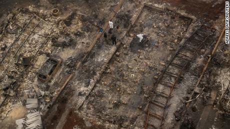 Personnel search for the remains of fire victims in the Bear Lakes Estates neighborhood in Phoenix, Oregon, on Saturday, September 12.