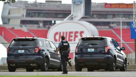  A police officer walks along the perimeter of the Truman Sports Complex during a standoff with a gunman at the complex in Kansas City, Missouri, on Saturday, September 12.