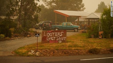 Oregon residents are illegally stopping drivers at gunpoint during wildfire evacuations, sheriff says