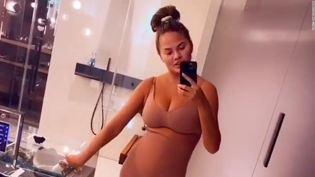Chrissy Teigen defends Kim Kardashian's maternity shapewear line in cute  video