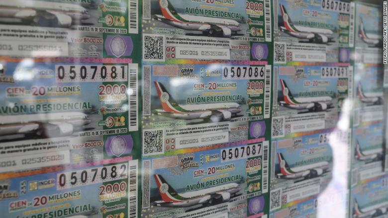 View of lottery tickets depicting the luxurious presidential plane in Mexico City, on March 10, 2020. 