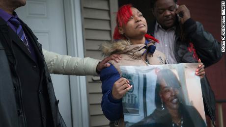 LaTonya Jones holds a picture of her mother Bettie Jones. 