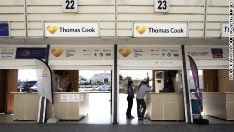 Travelers at a Thomas Cook kiosk at Heraklion International Airport on the island of Crete, Greece in September 2019. 