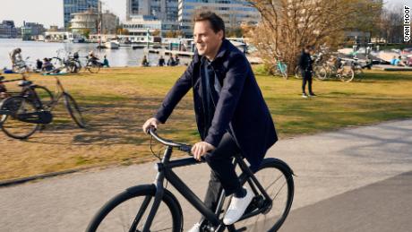 Van Moof CEO Taco Carlier rides one of his company&#39;s electric bikes.