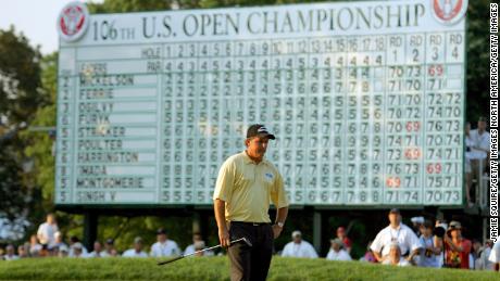 Mickelson stands on the 18th green after his last putt in the final round of the 2006 U.S. Open Championship.