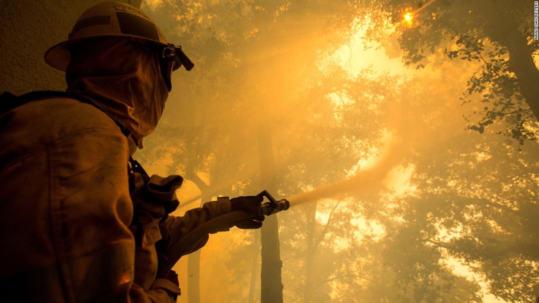 A firefighter battles the Bobcat Fire while defending the Mount Wilson observatory in Los Angeles on September 17.