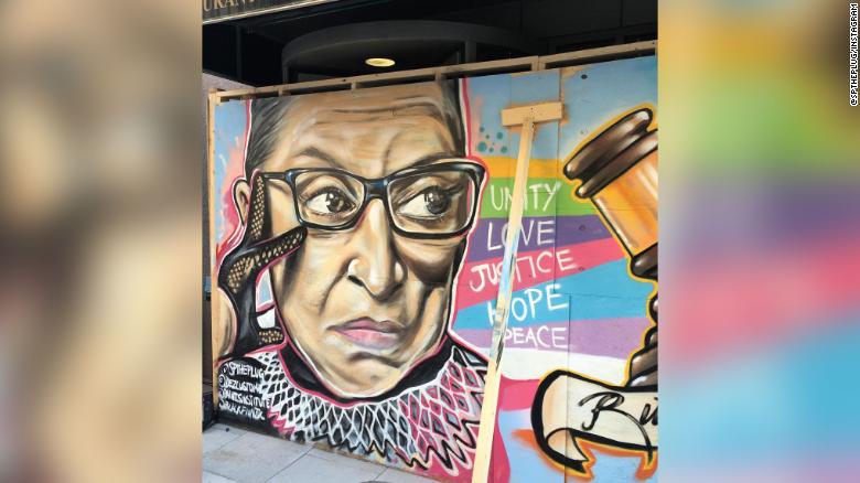 Two artists came up with a creative way to honor Ruth Bader Ginsburg: a mural in the justice’s memory