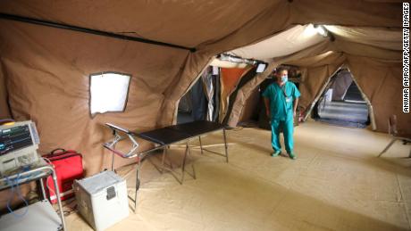 A medic walks around the coronavirus ward at the Italian field hospital at the Lebanese University campus in the town of Hadath in September 2020. 