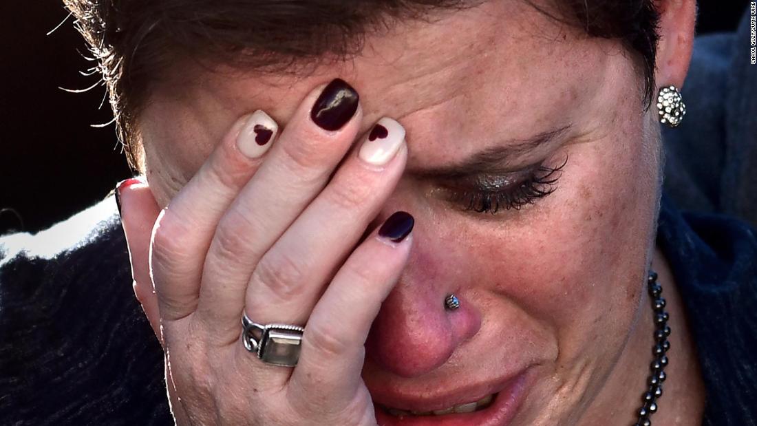 Michele Driesenga weeps during a vigil at the Supreme Court.