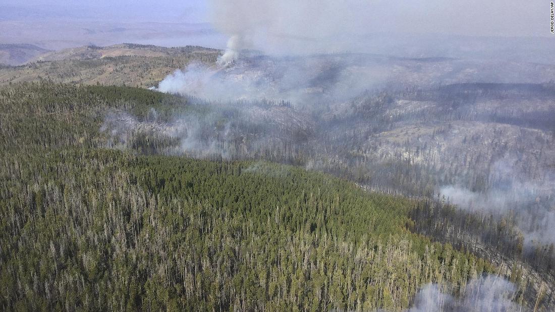 Wildfire smoke rises in Medicine Bow National Forest in southeastern Wyoming on September 21.