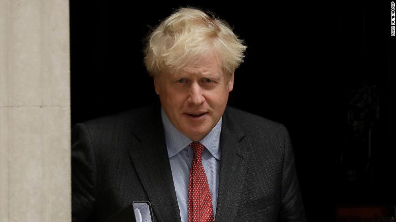 As UK faces new wave of virus, Johnson is under fire on many fronts