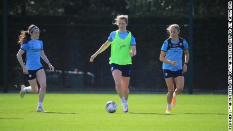 Manchester CIty&#39;s Rose Lavelle, Sam Mewis and Janine Beckie in action during training at Manchester City.