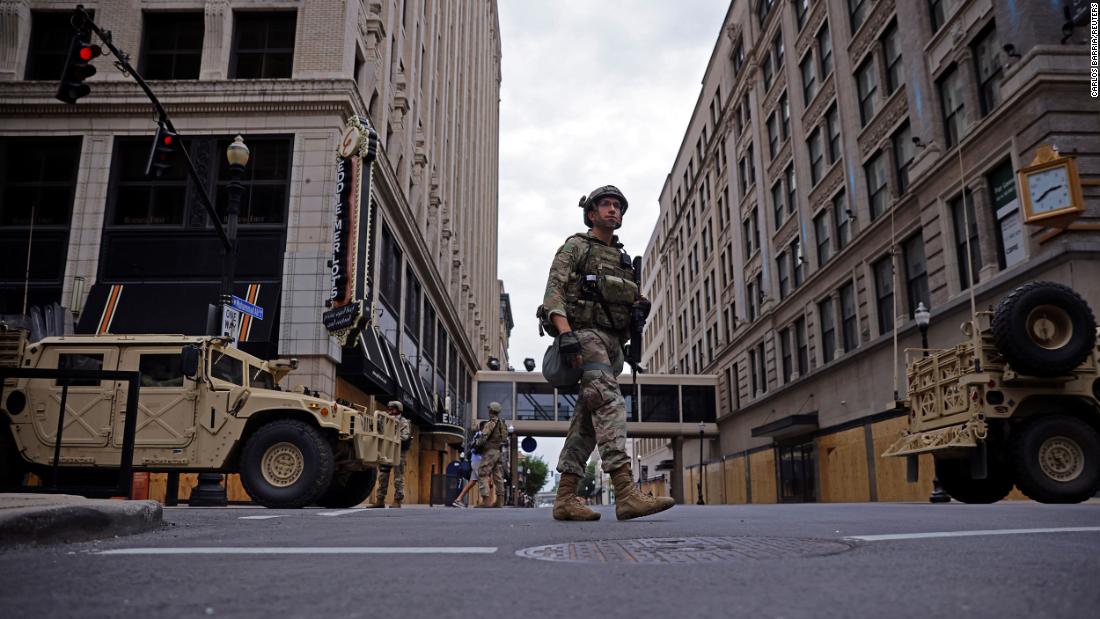 A member of the National Guard patrols downtown Louisville. 