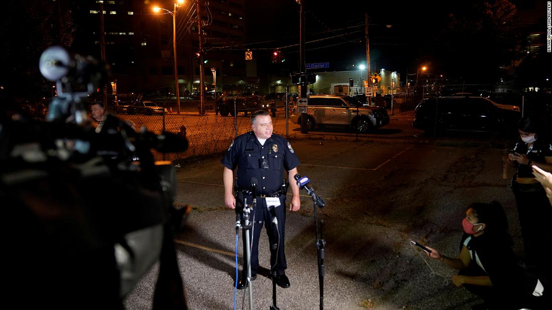 Louisville Metro Police Department interim police chief Robert Schroeder speaks to journalists as he confirms &lt;a href=&quot;https://www.cnn.com/us/live-news/breonna-taylor-announcement/h_acb84c21640413159d4c915dd56e4734&quot; target=&quot;_blank&quot;&gt;two officers were shot during protests&lt;/a&gt; in downtown Louisville. 
