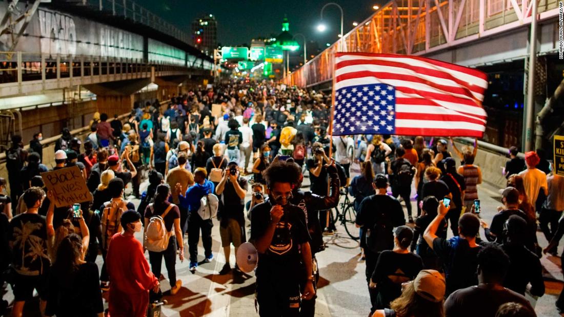 Demonstrators march on the Williamsburg Bridge in New York.