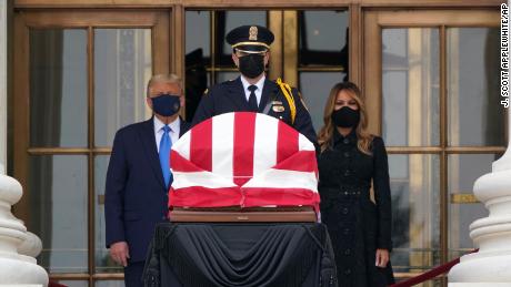 President Donald Trump and first lady Melania Trump pay respects as Justice Ruth Bader Ginsburg lies in repose at the Supreme Court building on Thursday, Sept. 24, 2020, in Washington. Ginsburg, 87, died of cancer on Sept. 18.