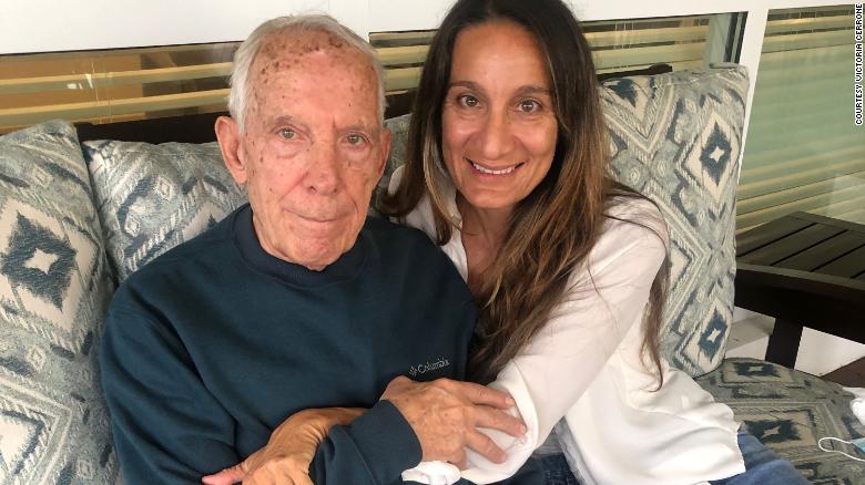 Victoria Cerrone had to wait six months to visit her father, Vittorio Cerrone, inside a memory care facility. This photo captures the lasting memory.