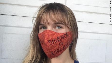 Lillian White wearing her &#39;silence is violence&#39; mask.