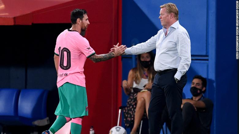 Messi shakes hands with Barca coach Ronald Koeman after he is substituted during the pre-season friendly match between FC Barcelona and Girona at Estadi Johan Cruyff on September 16, 2020.