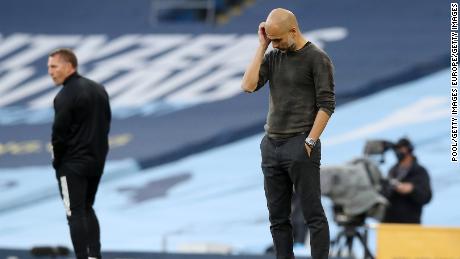 Guardiola looks dejected during the match against Leicester City.