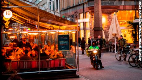 People dining in Stockholm on March 27. Sweden kept restaurants open as much of Europe went into lockdown. 