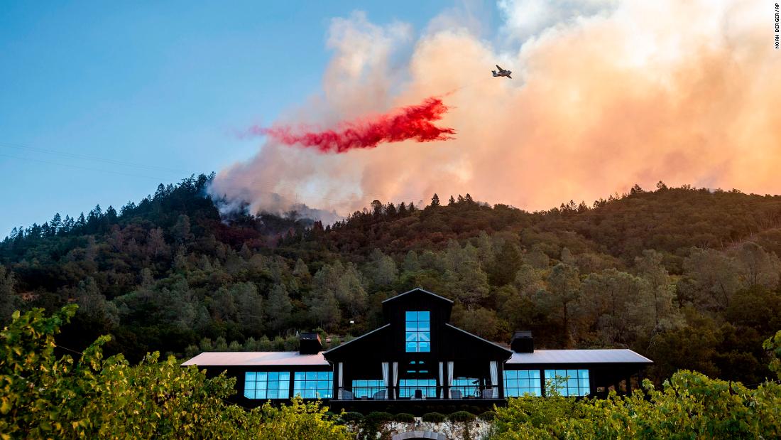 An air tanker drops fire retardant on the Glass Fire, which was burning near the Davis Estates winery in Calistoga on September 27, 2020. 