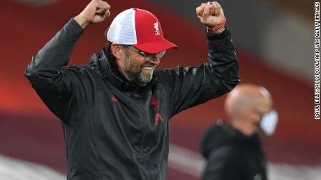 Liverpool manager Jürgen Klopp celebrates after Roberton&#39;s goal. 